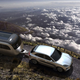 A render of a Porsche towing an Airstream RV trailer.